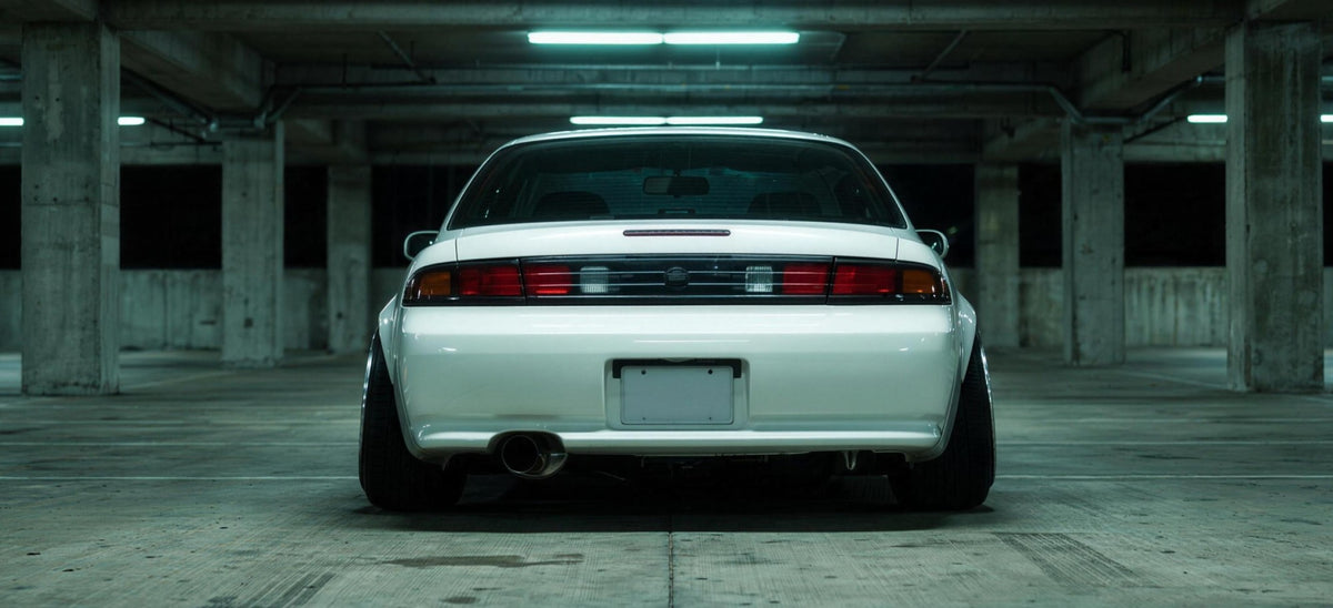 Rear view of a car sitting flush on Kansei wheels